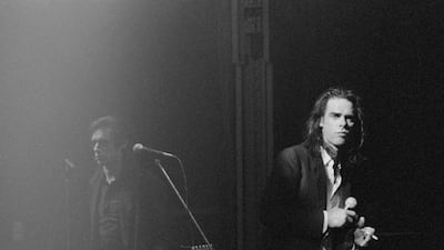 Nick Cave, right, with guitarist Blixa Bargeld of the Bad Seeds, perform in The Netherlands in the 1990s. Michel Linssen / Redferns