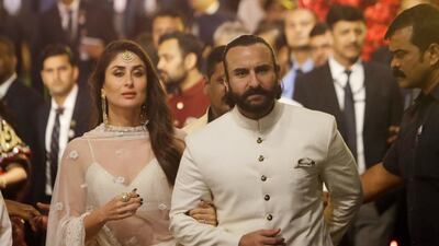 Bollywood actors Kareena Kapoor and Saif Ali Khan arrive to attend the wedding. AP Photo