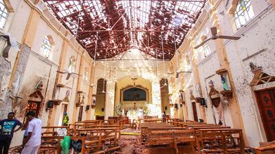 NEGOMBO, SRI LANKA - APRIL 21: Sri Lankan officials inspect St. Sebastian's Church in Negombo, north of Colombo, after multiple explosions targeting churches and hotels across Sri Lanka on April 21, 2019, in Negombo, Sri Lanka. At least 207 people have been killed and hundreds more injured after multiple explosions rocked three churches and three luxury hotels in and around Colombo as well as at Batticaloa in Sri Lanka during Easter Sunday mass. According to reports, at least 400 people were injured and are undergoing treatment as the blasts took place at churches in Colombo city as well as neighboring towns and hotels, including the Shangri-La, Kingsbury and Cinnamon Grand, during the worst violence in Sri Lanka since the civil war ended a decade ago. Christians worldwide celebrated Easter on Sunday, commemorating the day on which Jesus Christ is believed to have risen from the dead. (Photo by Stringer/Getty Images)