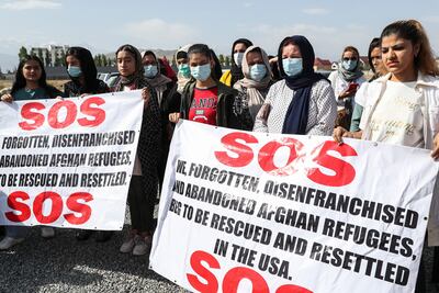 Afghan refugees protest in front of the US embassy in Bishkek, Kyrgyzstan, 19 August 2021. More than 60 Afghan refugees attend the protest asking diplomats to help them immigrate to the US and Canada. EPA