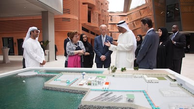 Mr Biden with Dr Sultan Ahmed Al Jaber UAE Minister of State and Chairman of Masdar (3rd R) during a tour of Masdar City. Seen with Reem Al Hashimy Minister of State for International Co-operation (R), Dr Nawal Al Hosany (3rd L) and Barbara Leaf, former US ambassador to the UAE (2nd L). Crown Prince Court - Abu Dhabi, March 7, 2016