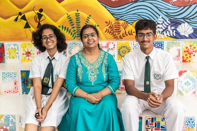 Gayathri Ramani with her son Aditya Iyer and her daughter Anju Iyer. Antonie Robertson / The National