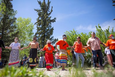 A round dance is performed in response to the discovery of children's remains at the Kamloops Indian Residential School. AP