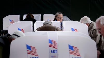People cast their ballots at a community centre during early voting in Potomac, Maryland, two weeks ahead of the key US midterm polls. AFP