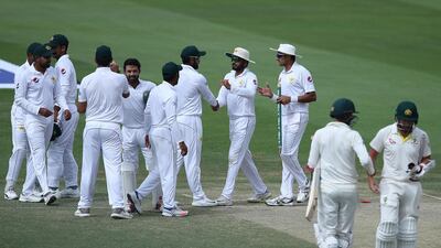 Pakistan players celebrate after they beat Australia in their test match. AP Photo