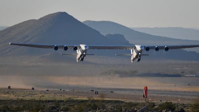 The world's largest airplane, built by the late Paul Allen's company Stratolaunch Systems, takes off on its first test flight in Mojave, California. Reuters