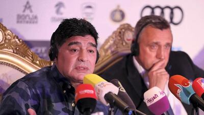Diego Maradona, the new chairman of Belarus club Dynamo Brest, left, and Valdas Ivanauskas, the club's vice chairman, at a press conference held at Emirates Palace hotel in Abu Dhabi. Pawan Singh / The National