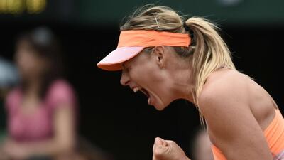 Maria Sharapova celebrates during the quarter-finals of the French Open, which she went on to win. Pascal Guyot / AFP / June 3, 2014