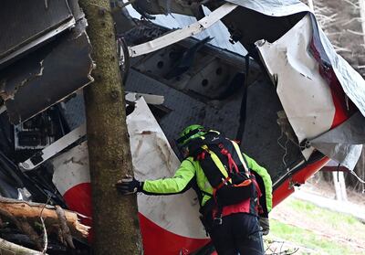 Wreckage from the cable car crashed down the mountain. EPA