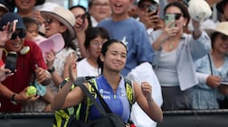 Alexandra Eala applauds fans as she leaves the court at the Australian Open. AFP