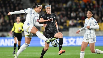 Philippines' Hali Long, left, and New Zealand's Hannah Wilkinson compete for the ball. AP