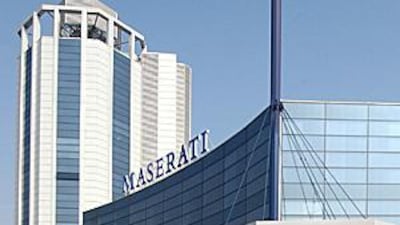 The Maserati tower dominates Modena's skyline.