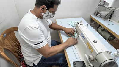 The company, which Ms Burford runs in her spare time with her husband, started making face masks as a hobby for children in the neighbourhood so they could play together.: Antonie Robertson / The National