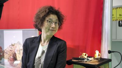 Miwako Yanagisawa, a jewellery designer displays her creations at Adihex in Abu Dhabi on Tuesday. Pawan Singh / The National