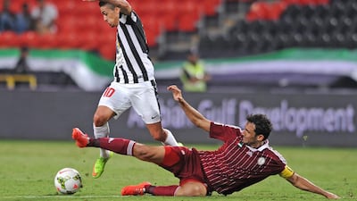 Manuel Lanzini, left, of Al Jazira in action against Al Wahda during their Arabian Gulf League match at Mohammed bin Zayed Stadium in Abu Dhabi on November 30, 2014. Courtesy Al Ittihad