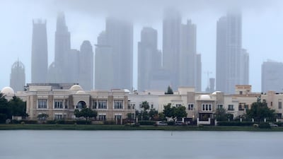 Rain comes down hard in Dubai's Springs community. Chris Whiteoak / The National