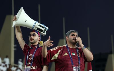 Al Wahda fans cheer their team to victory against Qatar's Al Duhail at Al Nahyan Stadium. Chris Whiteoak / The National