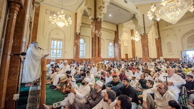 Worshippers gather for Friday prayers in Al Qasba mosque, in Sharjah. Ahmed Ramzan / The National