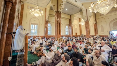 Worshippers gather for Friday prayers in Al Qasba mosque, in Sharjah. Ahmed Ramzan / The National