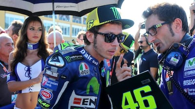 Yamaha ider Valentino Rossi of Italy, centre, was critical of his teammate Jorge Lorenzo winning the title, claiming he had help from fellow Spanish riders. Lorenzo claims Rossi is just frustrated over not being as fast as the 'younger riders'. Heina Kalis / Reuters