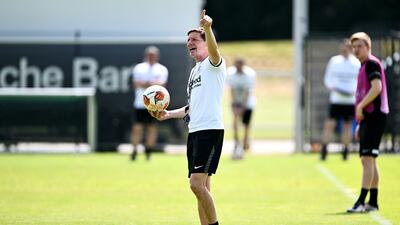 Oliver Glasner, manager of Eintracht Frankfurt, gives instructions to his players during training. Getty