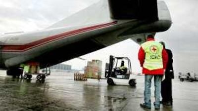 Medical supplies for Gaza donated by the Red Cross are loaded into an Antonov An-12 aircraft last month in Geneva.