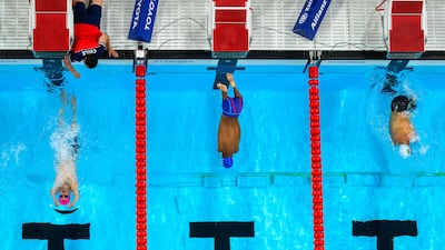 From left, Chile's Alberto Caroly Abarza Diaz, Gabriel, and Brazil's Bruno Becker da Silva compete for a place in the Men's 200m Freestyle race
