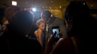 Tampa Bay Rays outfielder Dayron Varona hugs his niece Melissa Cabrera as he sees members of his family living in Havana, Cuba for the first time in three years, after arriving at the team hotel in Havana, Cuba. The Rays will play a game against Cuba’s national team on March 22. Rebecca Blackwell / AP