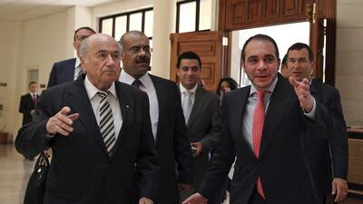 Prince Ali Bin al-Hussein, right, meets FIFA president Sepp Blatter during his regional tour to Jordan. Prince Ali will oppose Blatter to become the head of football's governing body. Mohammad Hannon/AP Photo