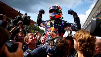 Daniel Ricciardo of Australia and Infiniti Red Bull Racing celebrates in Parc Ferme after winning the Belgian Grand Prix at Circuit de Spa-Francorchamps on August 24, 2014. Dan Istitene / Getty Images