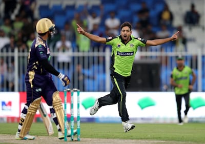 Sharjah, United Arab Emirates - February 23, 2019: Lahore's Haris Rauf takes the wicked of Quetta's Umar Akmal during the game between Lahore Qalandars and Quetta Gladiators in the Pakistan Super League. Saturday the 23rd of February 2019 at Sharjah Cricket Stadium, Sharjah. Chris Whiteoak / The National
