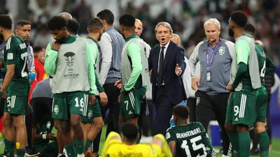Roberto Mancini talks to his players before extra time during the AFC Asian Cup Round of 16 match between Saudi Arabia and South Korea. Getty Images