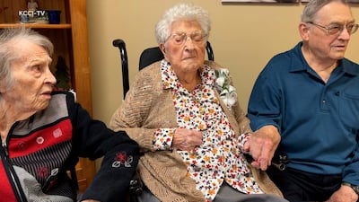 Bessie Laurena Hendricks, centre, celebrating her 115th birthday in November 2022. AP