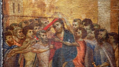 A part of the painting "Christ Mocked", a long-lost masterpiece by Florentine Renaissance artist Cimabue in the late 13th century, which was found months ago hanging in an elderly woman's kitchen in the town of Compiegne, is seen in Paris, France, September 24, 2019. REUTERS/Charles Platiau/File Photo