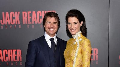 Tom Cruise and Cobie Smulders. Mike Coppola / Getty Images / AFP