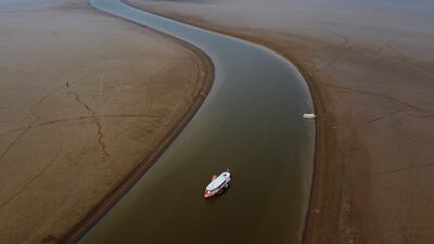 A ferry near Manacapuru, Brazil, travels a section of the Amazon River affected by severe drought. AP