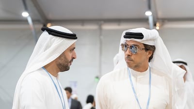 Sheikh Mansour, right, and Sheikh Mohamed bin Hamad, private affairs adviser for the Presidential Court. Rashed Al Mansoori / UAE Presidential Court