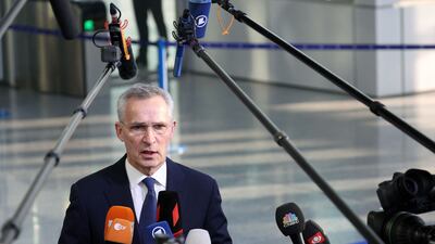 Jens Stoltenberg arrives for a Nato summit in Brussels on Thursday. AFP
