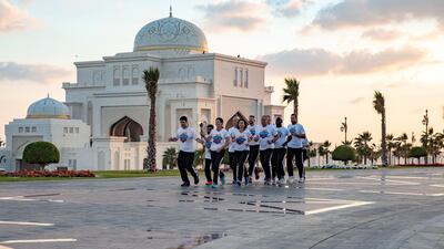 Runners enter the Presidential Palace grounds.