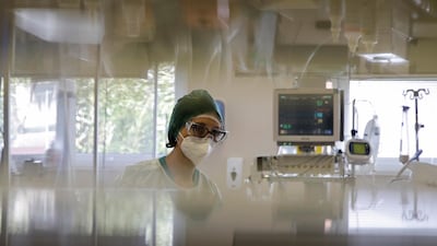 Paramedic Alessandra works at the Intensive Care Unit of the Varese’s Circolo Hospital, in Varese. AP Photo