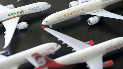 An Etihad 777-300 and Eva Air 787 are among the 900 plane models in Ben Matar's collection.