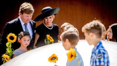 Dutch King Willem-Alexander, left, and Queen Maxima during the revealing of the National Monument for the MH17 victims in Vijfhuizen, The Netherlands, Monday, July 17, 2017. Remko de Waal/ Pool via AP