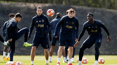 Manchester United's Paul Pogba and Matteo Darmian during training. Reuters