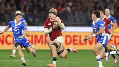 Henry Pollock carries the ball as the British & Irish Lions ran in eight tries against Western Force. Getty Images