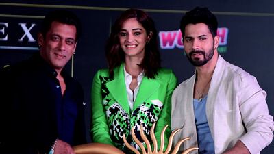 Bollywood actors Salman Khan, left, Ananya Pandey, centre and Varun Dhawan attend the press conference for the 22nd edition of the International Indian Film Academy (IIFA) Weekend and Awards, in Mumbai on March 28, 2022. AFP