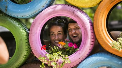 Visitors set up their tent on Shipyard Island, the venue of the 22nd Sziget (Island) Festival on the Shipyard Island in Northern Budapest, Hungary. EPA