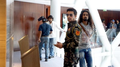Jimmy Shergill on set at the Hyatt Capital Gate hotel in Abu Dhabi on Wednesday. Delores Johnson / The National
