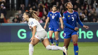Switzerland midfielder Seraina Piubel celebrates after scoring. EPA