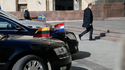 Diplomatic cars parked near the Russian foreign ministry headquarters as ambassadors are summoned to announce Russian countermeasures over the Skripal affair. EPA/MAXIM SHIPENKOV