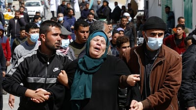 The mother of one of three fishermen killed when their boat exploded off Gaza's coast, reacts outside Nasser Hospital in Khan Yunis in the southern Gaza Strip. AFP